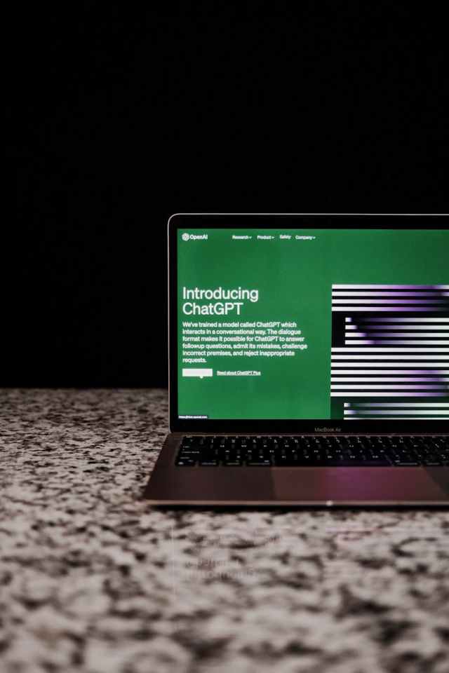 Current image: view of a laptop displaying chatgpt